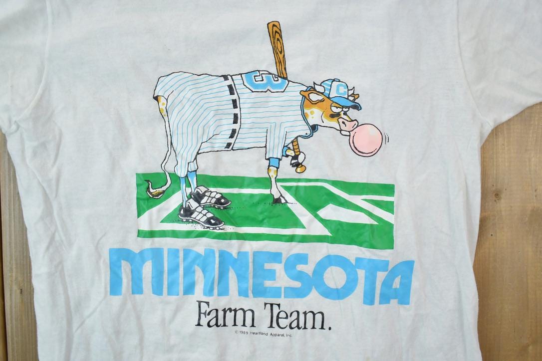 Vintage 1989 Heartland Apparel Minnesota Farm Team Graphic T-Shirt