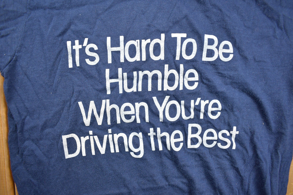 Vintage 1980s "Its Hard To Be Humble When You're Driving The Best" Graphic T Shirt