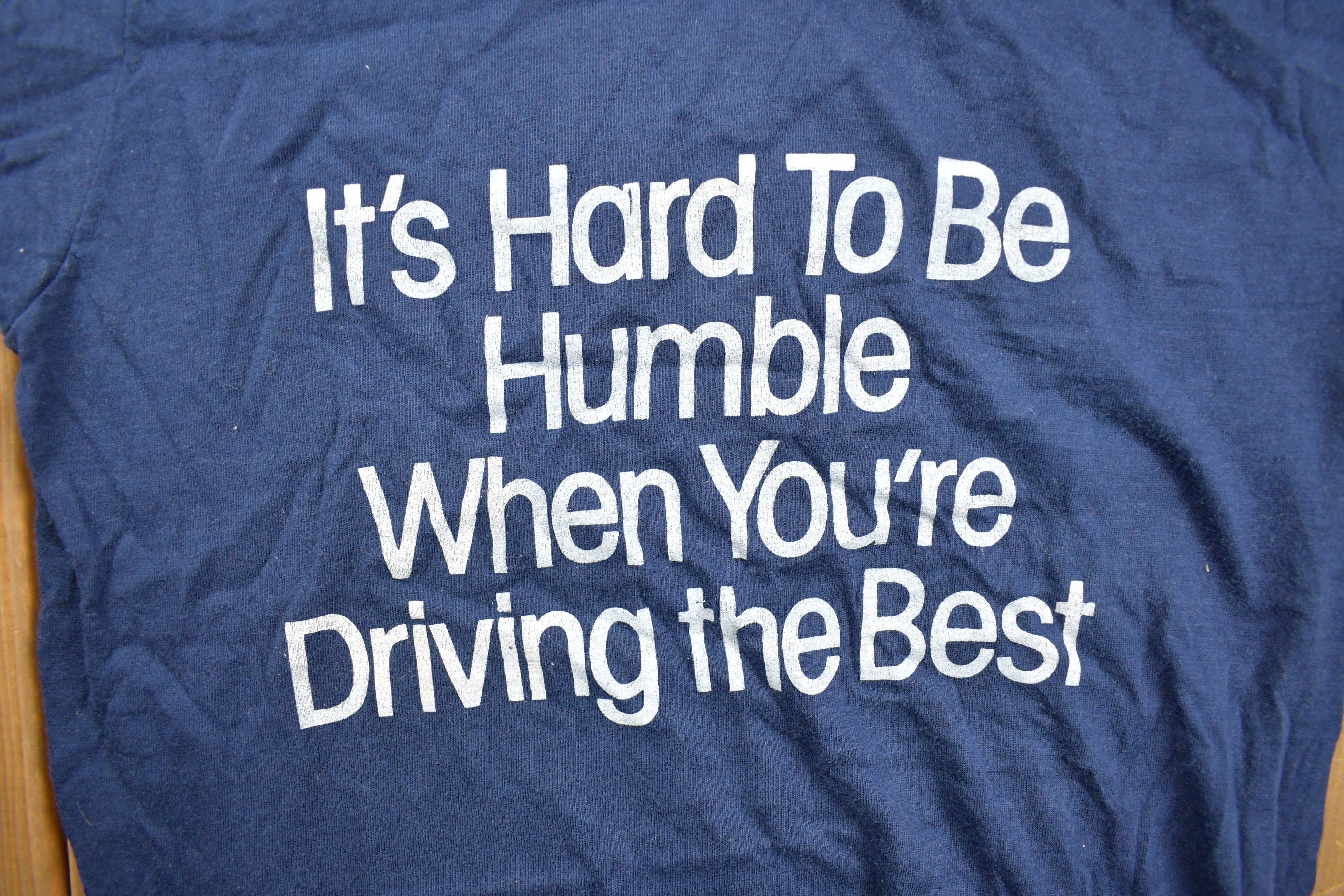 Vintage 1980s "Its Hard To Be Humble When You're Driving The Best" Graphic T Shirt