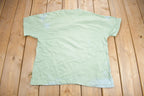 Vintage 1990s A Women's Place Is On The Court" Graphic T Shirt