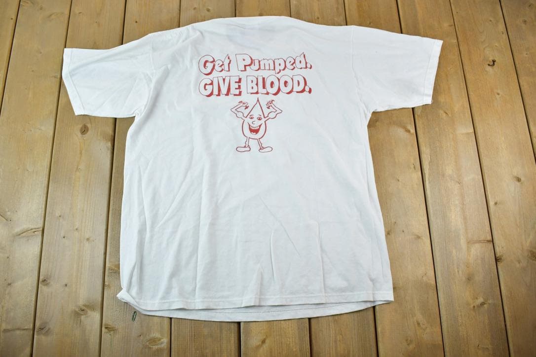 Vintage 1990s Get Pumped Give Blood Souvenir Single Stitch Graphic Print T-Shirt
