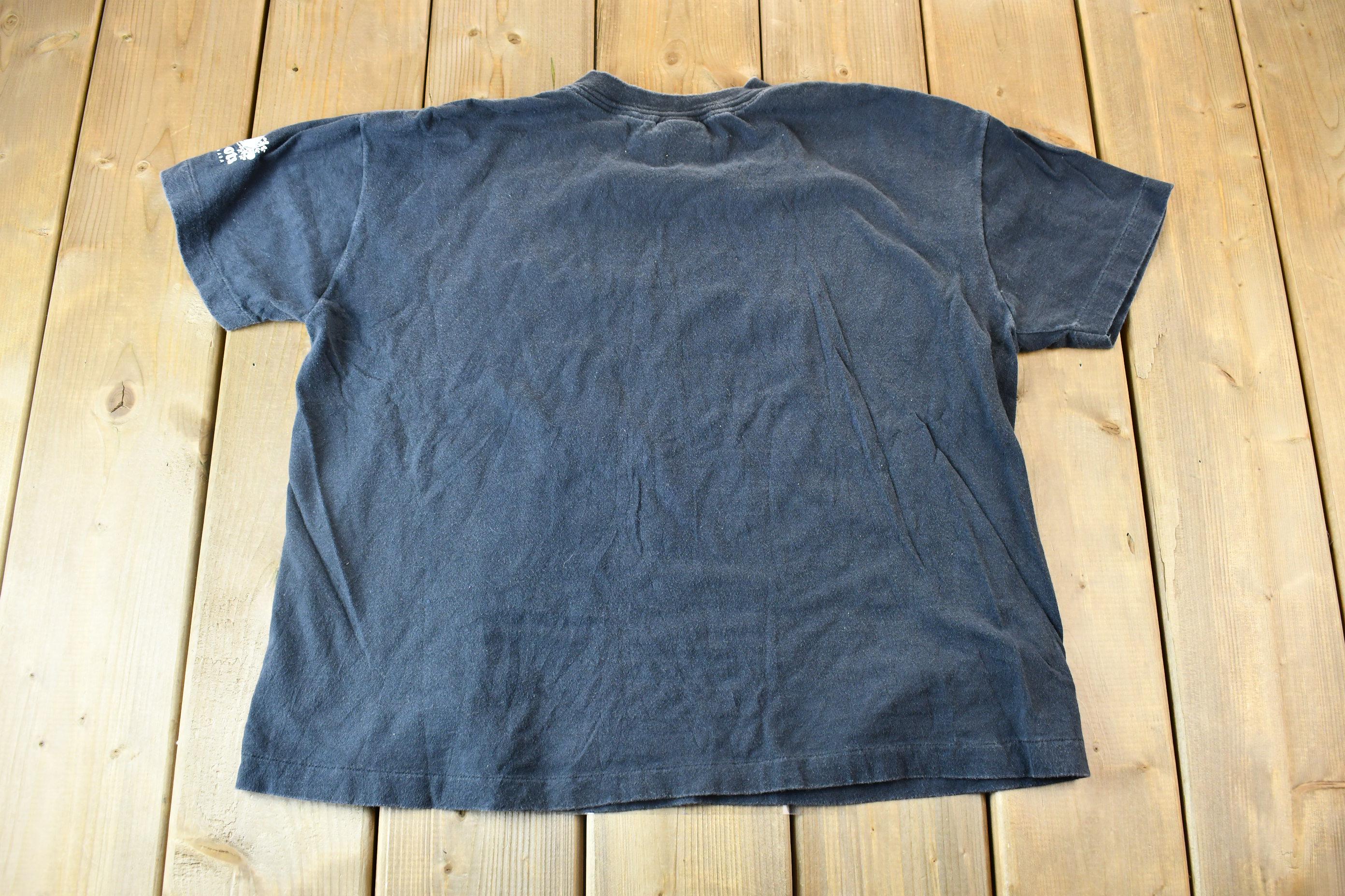 Vintage 1990s Roots Athletics Phantom of the Opera Graphic T-Shirt
