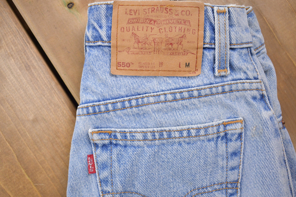 Vintage 1990s Levi's 550 Red Tab Light Wash Jeans Size 26 x 29