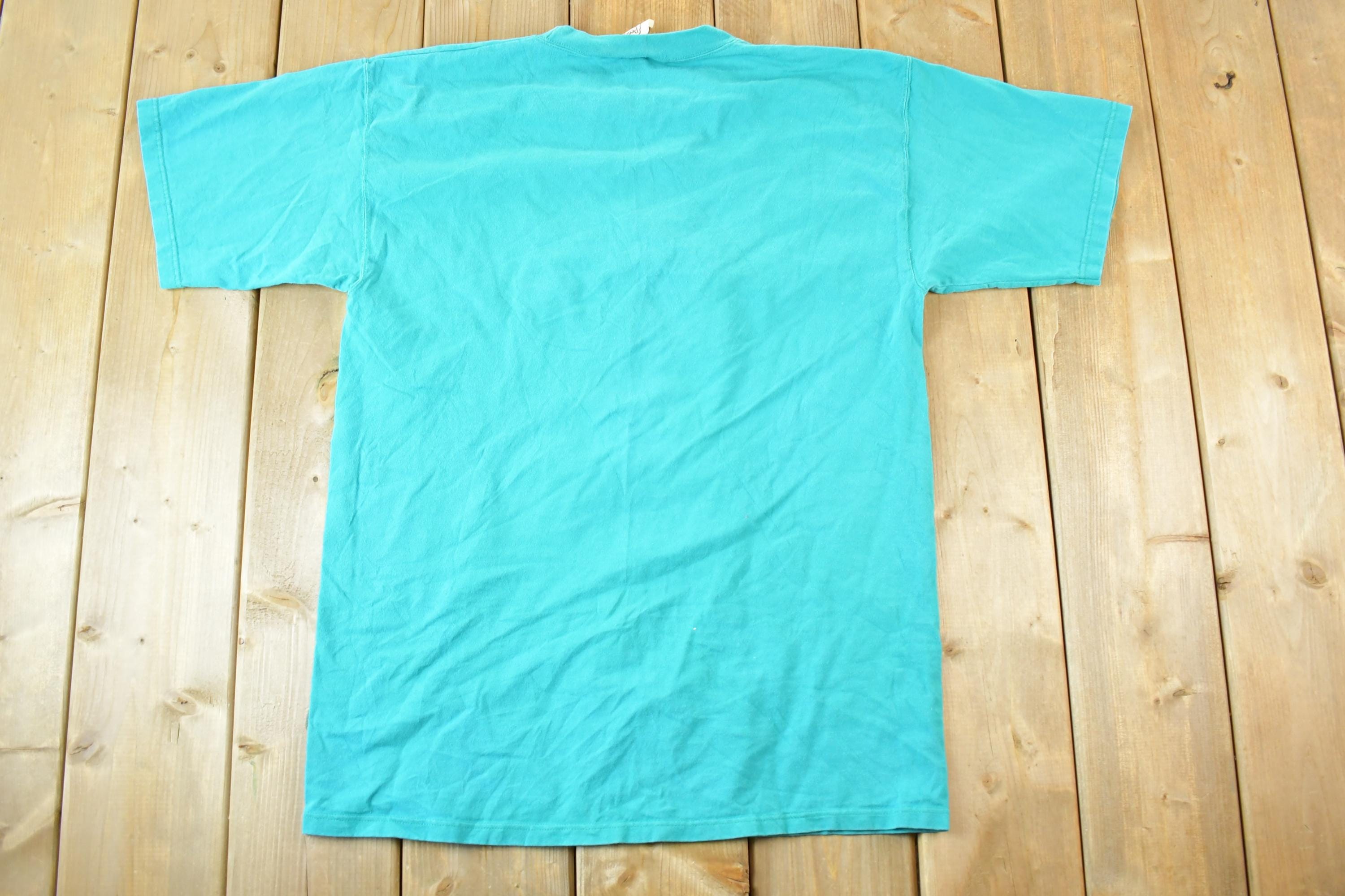 Vintage 1990s Lakeview Resort Souvenir Lady Golfing T-Shirt Mens L
