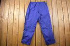 Vintage 1990s Blue Nike Mini Swoosh Track Pants Size L