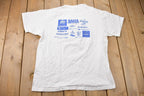 Vintage 1995 Memorial Day Gate to Gate Jet Graphic T-Shirt