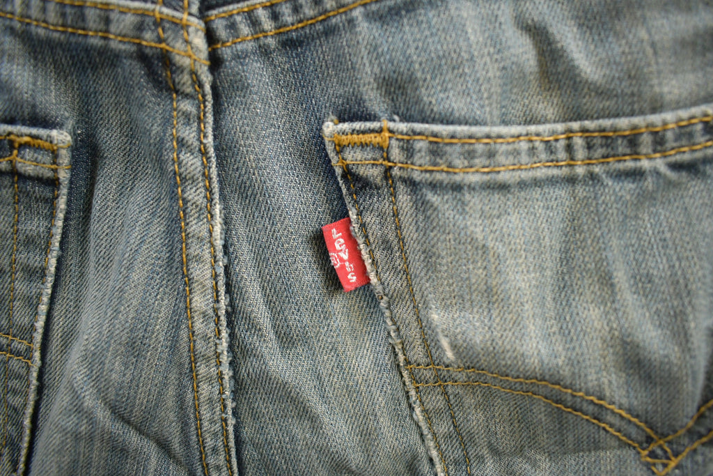 Vintage 1990s Levi's 521 Distressed Jeans Size 29x32