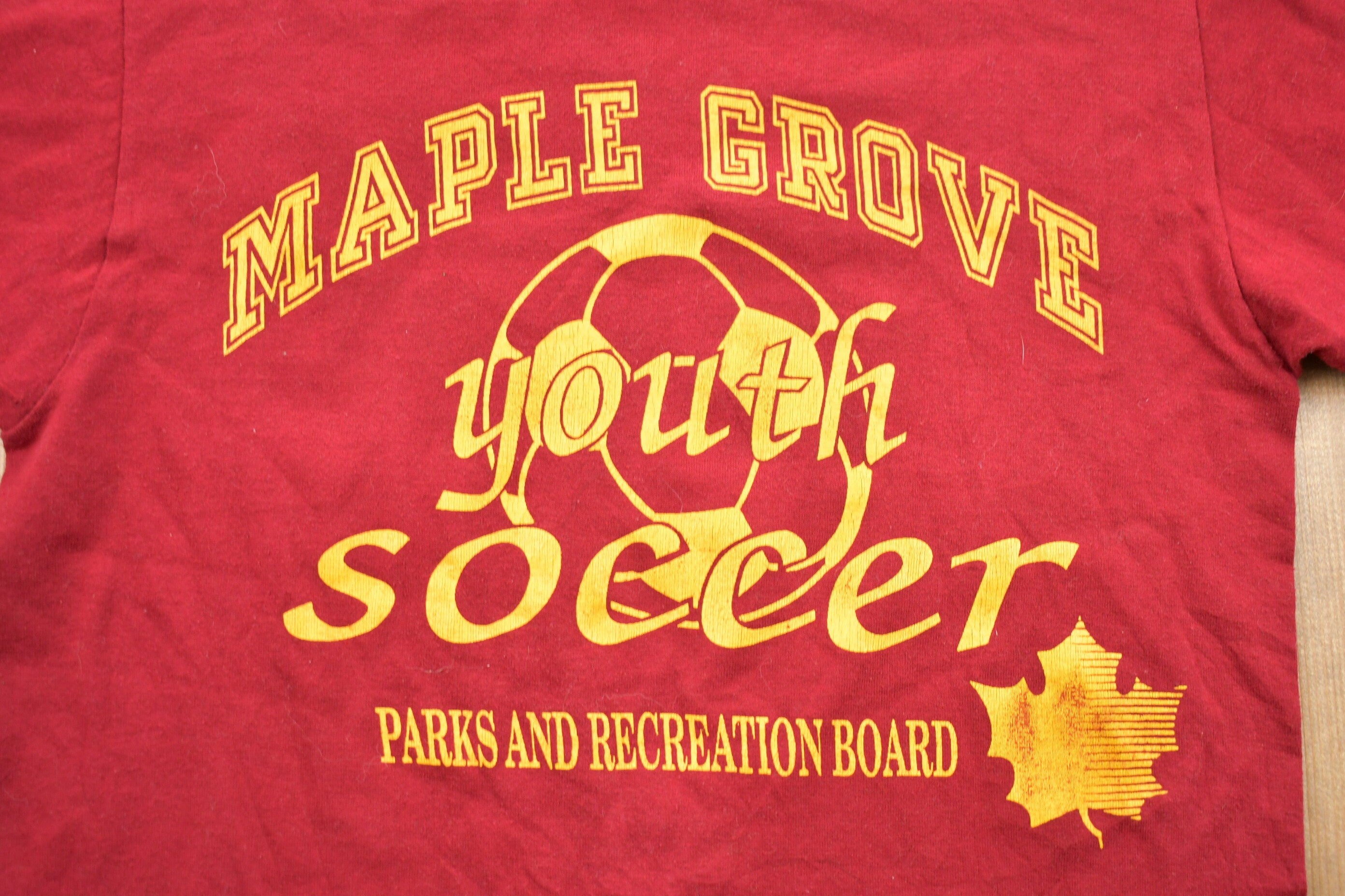 Vintage 1980s Kids Russell Athletic Maple Grove Soccer Graphic T-Shirt