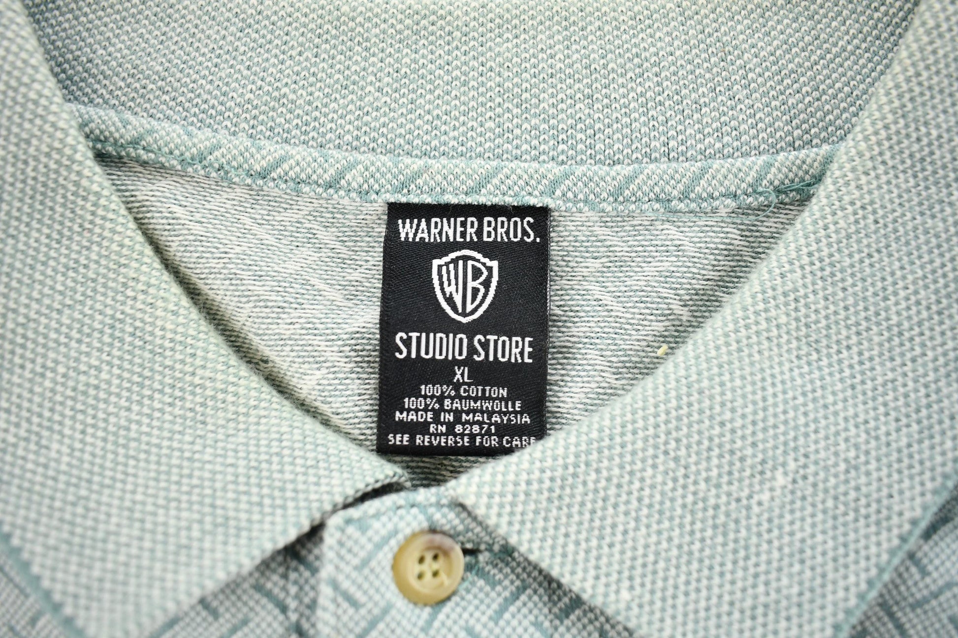 Vintage 2000s Daffy Duck Abstract Pattern Golf Polo Shirt