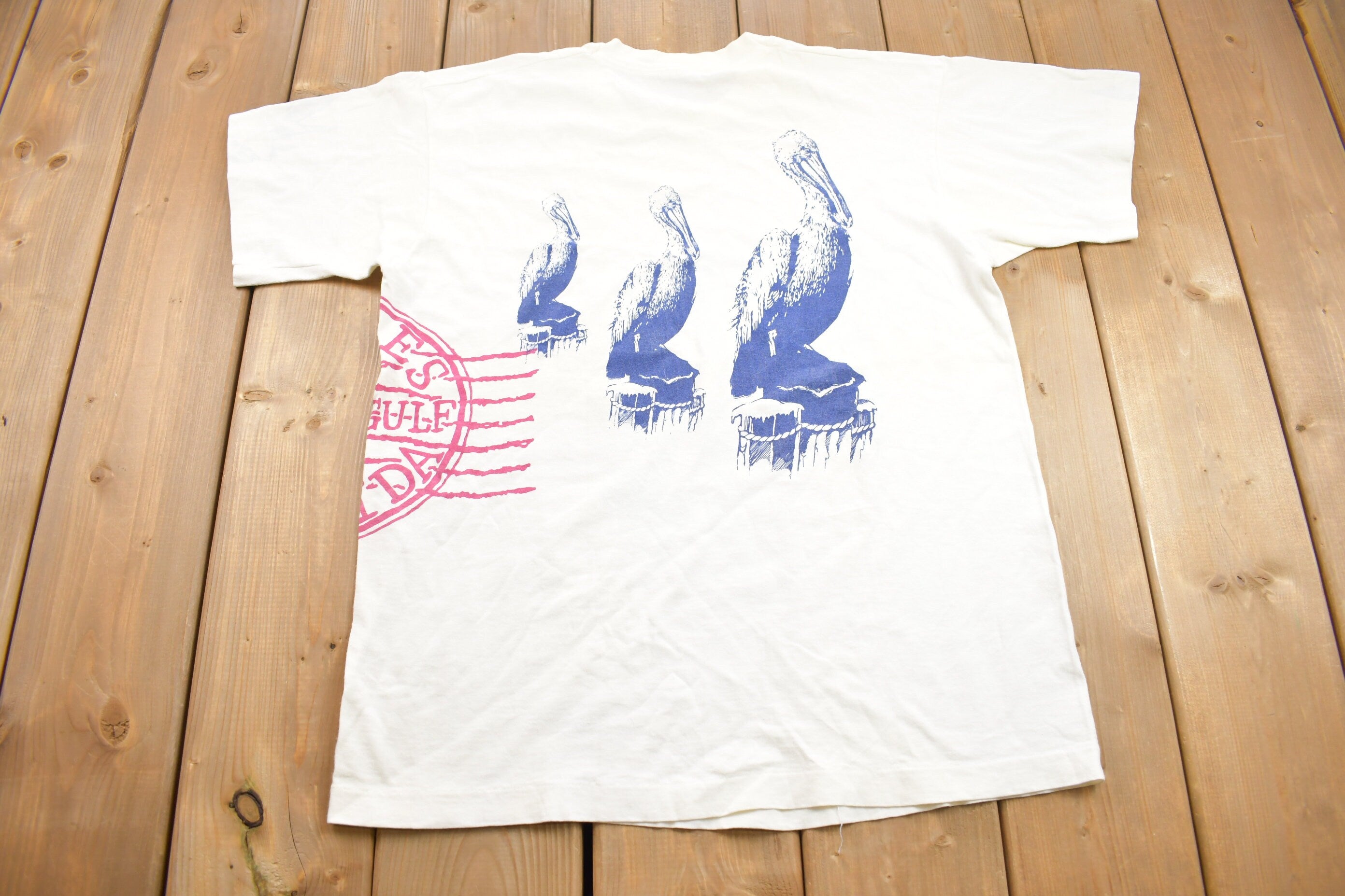 Vintage 1990s Naples Gulf of Florida Pelicans Graphic T-Shirt
