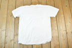 Vintage 1990s Arizona Skeleton Pool But It's A Dry Heat Souvenir T-Shirt Mens L