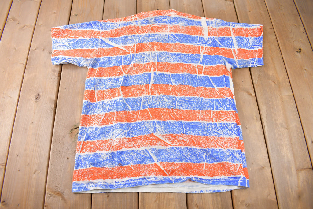 Vintage 1990s Denver Broncos NFL Football All Over Print Graphic T-Shirt Made In USA