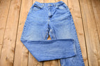 Vintage 1990s Riders Light Wash Relaxed Fit Tapered Mom Jeans