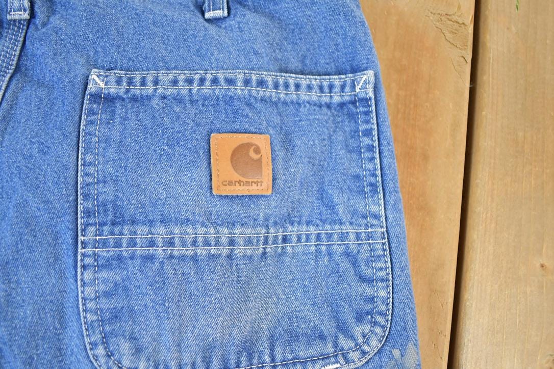 Vintage 1990s Carhartt Loose Fit Denim Work Jeans Size 34 x 34
