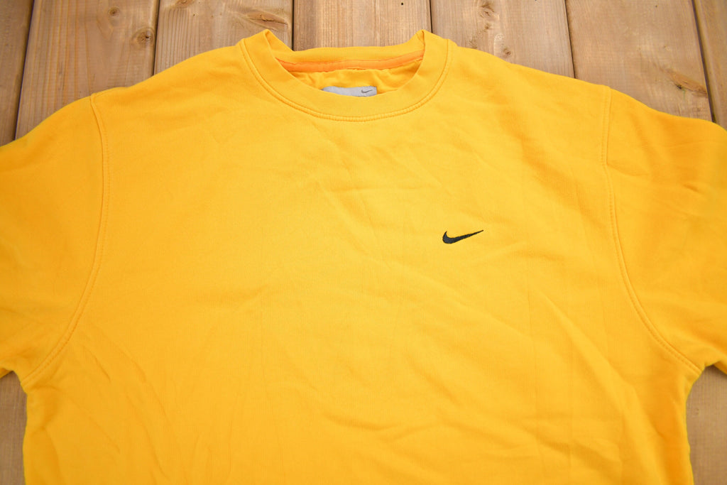 Vintage Y2K Nike Yellow Embroidered Mini Swoosh Crewneck Sweatshirt