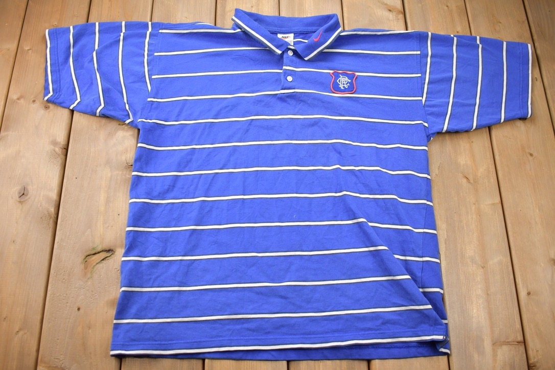 Vintage 1990s Nike Swoosh Embroidered Blue Polo T-Shirt