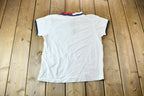Vintage 1990s Tommy Hilfiger Women's Red White and Blue Zipper Polo Shirt
