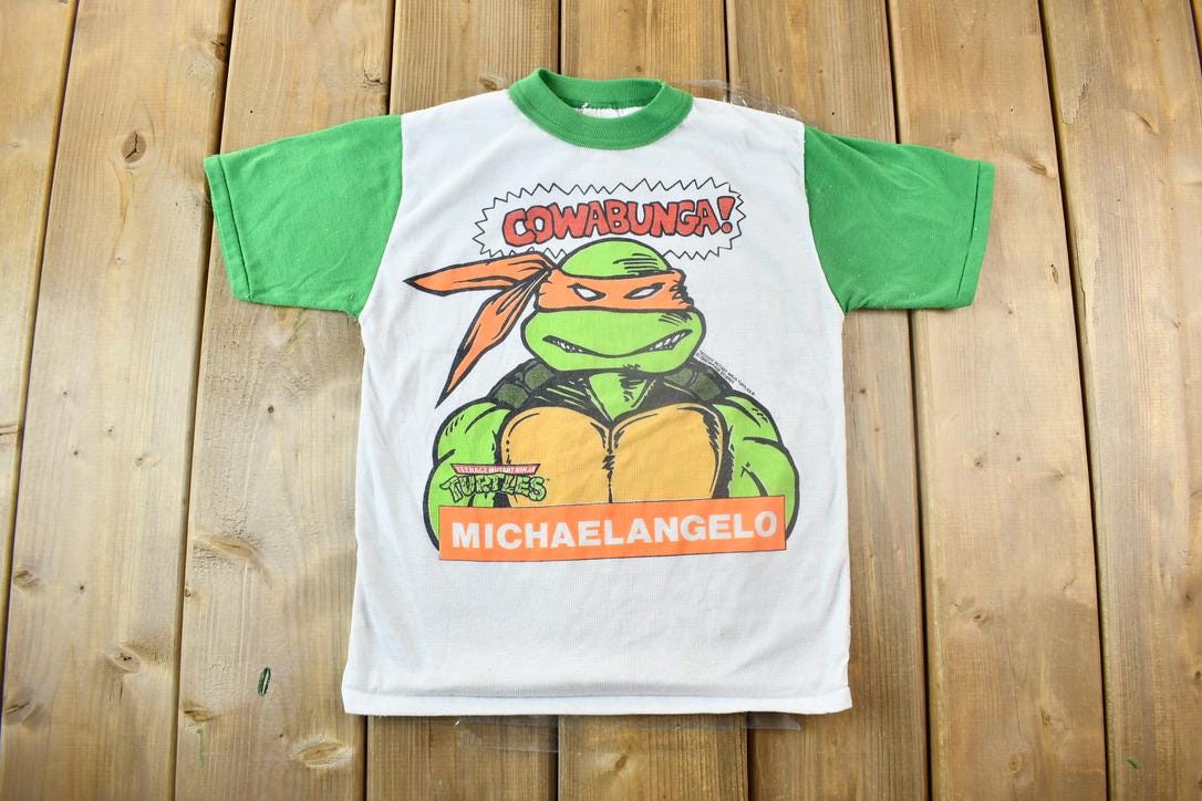 Vintage 1990 Teenage Mutant Ninja Turtles Cowabunga Michaelangelo Graphic Child Size T-Shirt