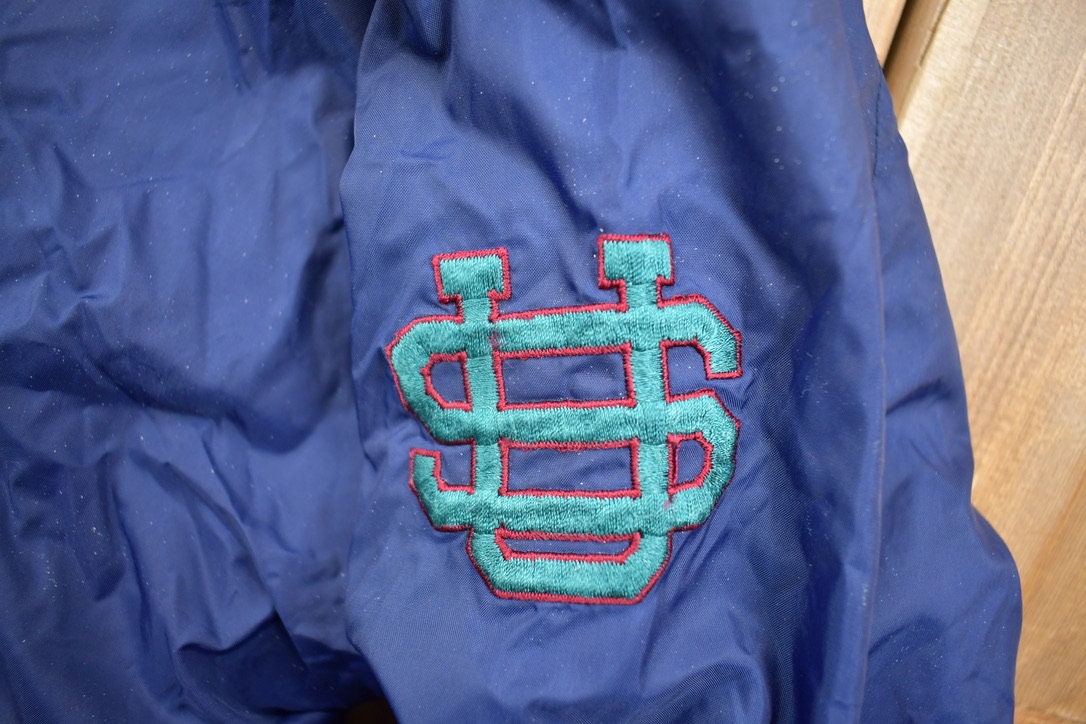 Vintage 1990s Universal Studios Embroidered Windbreaker Jacket