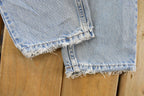 Vintage 1990s Levi's 560 Loose Tapered Denim Jeans Men's 26 x 31 / 90s Levi's / Distressed Sun Faded Jeans