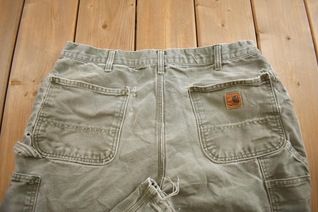 Vintage 1990s Carhartt Distressed Dungaree Fit Work Pants Size 36x32