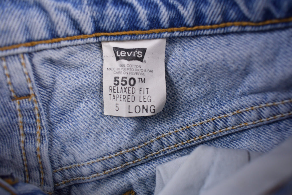 Vintage 1990s Levi's 550 Red Tab Jeans Size 26 x 23 / 90s Denim / Streetwear Fashion / Vintage Denim / Jeans / Light Wash / Vintage Levi's