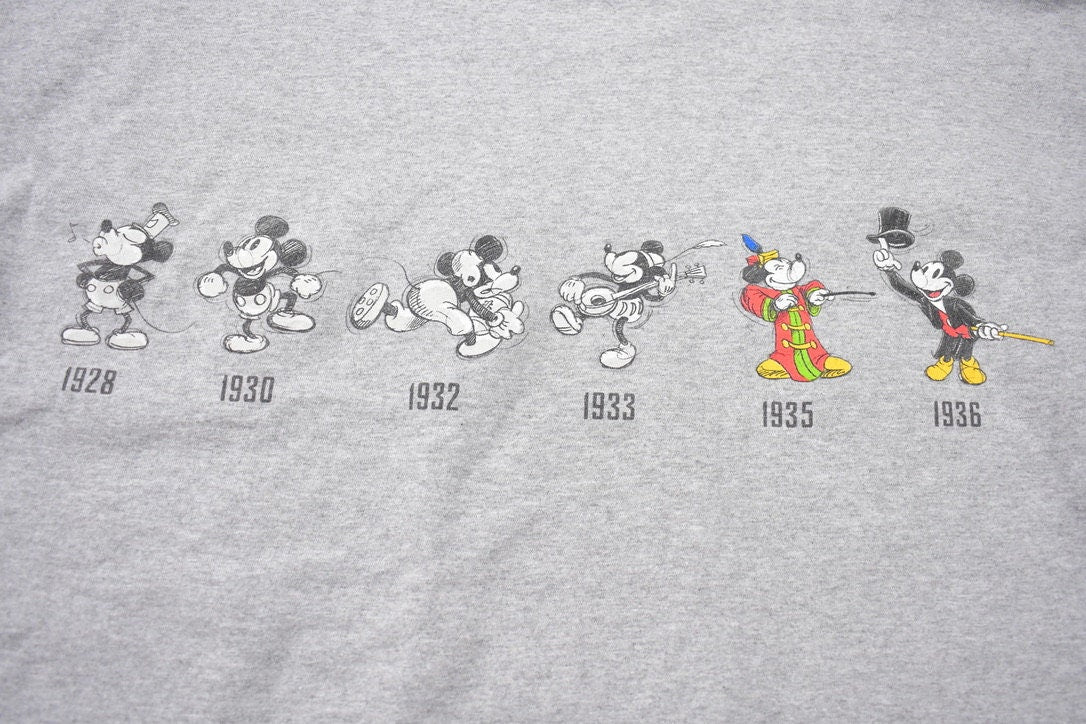 Vintage 2000s Walt Disney World Mickey Mouse Over the Years T-Shirt