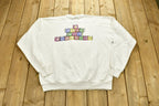 Vintage 1990s "Feed The Children" Graphic Christmas Sweater , 90s Holiday Crewneck , Winter Wear , Festive Graphic Print