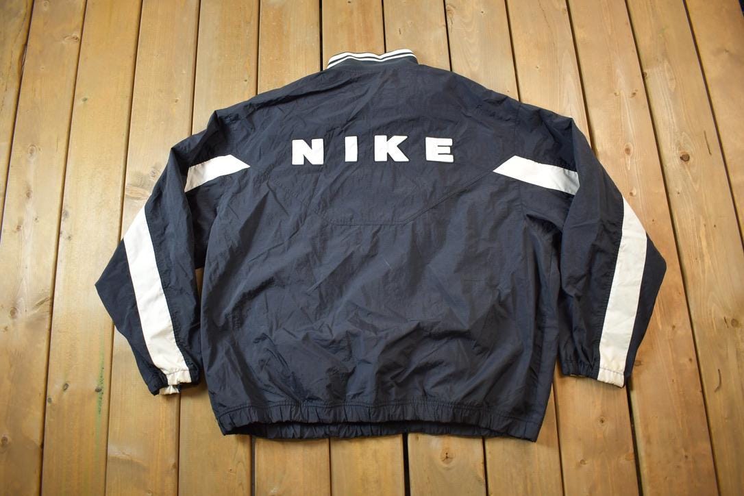 Vintage 1990s Nike Red Tab Back Spellout Windbreaker Jacket - XXL