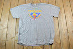 Vintage 1990s Nike Olympia Sports Camp Graphic T-Shirt