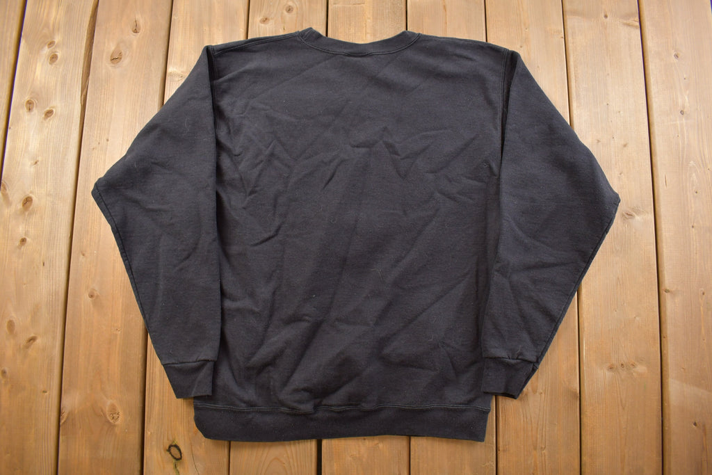 Vintage 1990s Planet Hollywood Seattle Embroidered Crewneck Sweatshirt