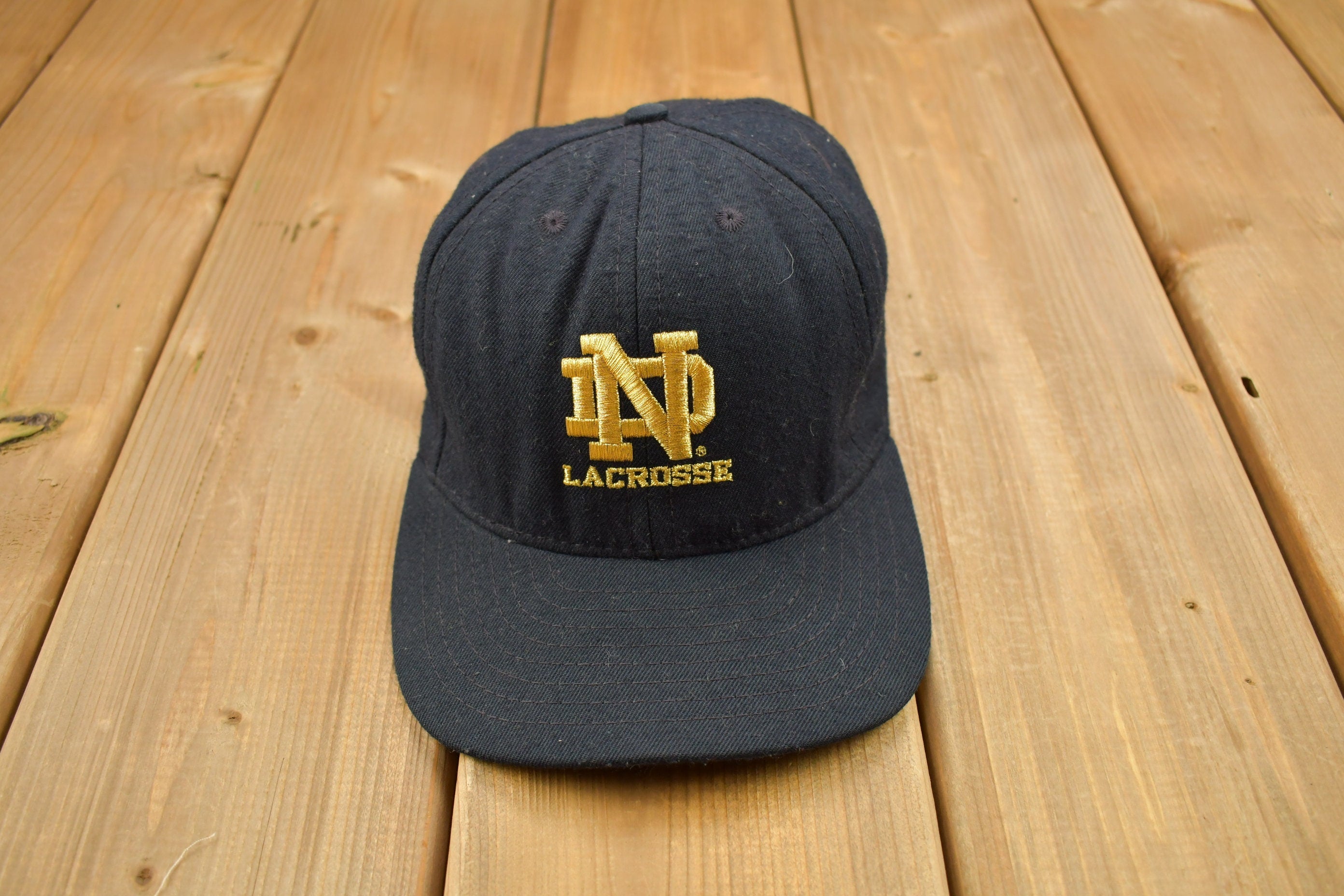 Vintage 1990s University Of Notre Dame Lacrosse Collegiate Champion Snap Back Hat