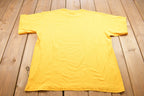 Vintage 1990s Nike Spell Out Yellow Graphic T Shirt