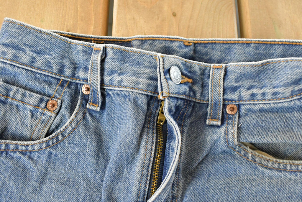 Vintage 1990s Levi's Denim Jeans Women's 26 x 34 / Original Fit / 90s Levi's / Distressed Sun Faded Jeans
