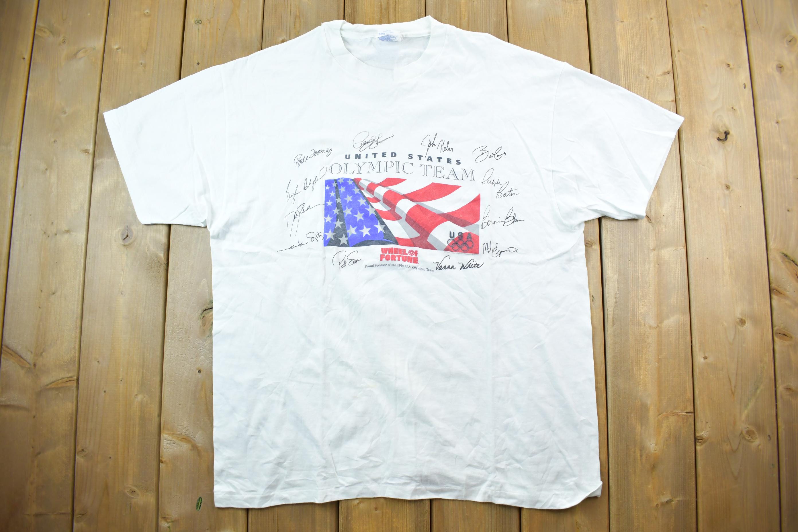 Vintage 1996 United States Olympic Team Wheel Of Fortune Souvenir T-Shirt