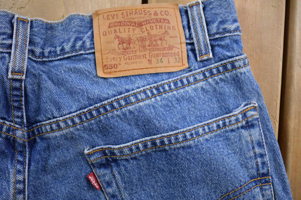 Vintage 1990s Levi's 550 Red Tab Denim Jeans Size 32 x 31