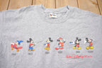 Vintage 2000s Walt Disney World Mickey Mouse Over the Years T-Shirt