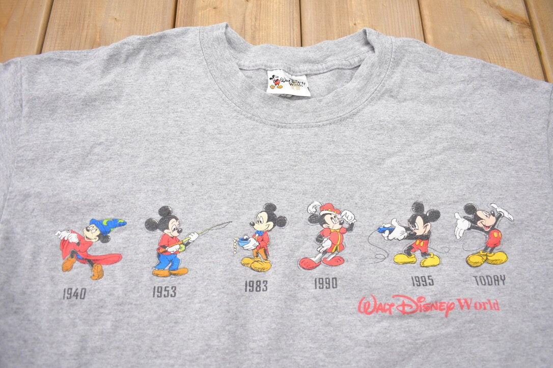 Vintage 2000s Walt Disney World Mickey Mouse Over the Years T-Shirt