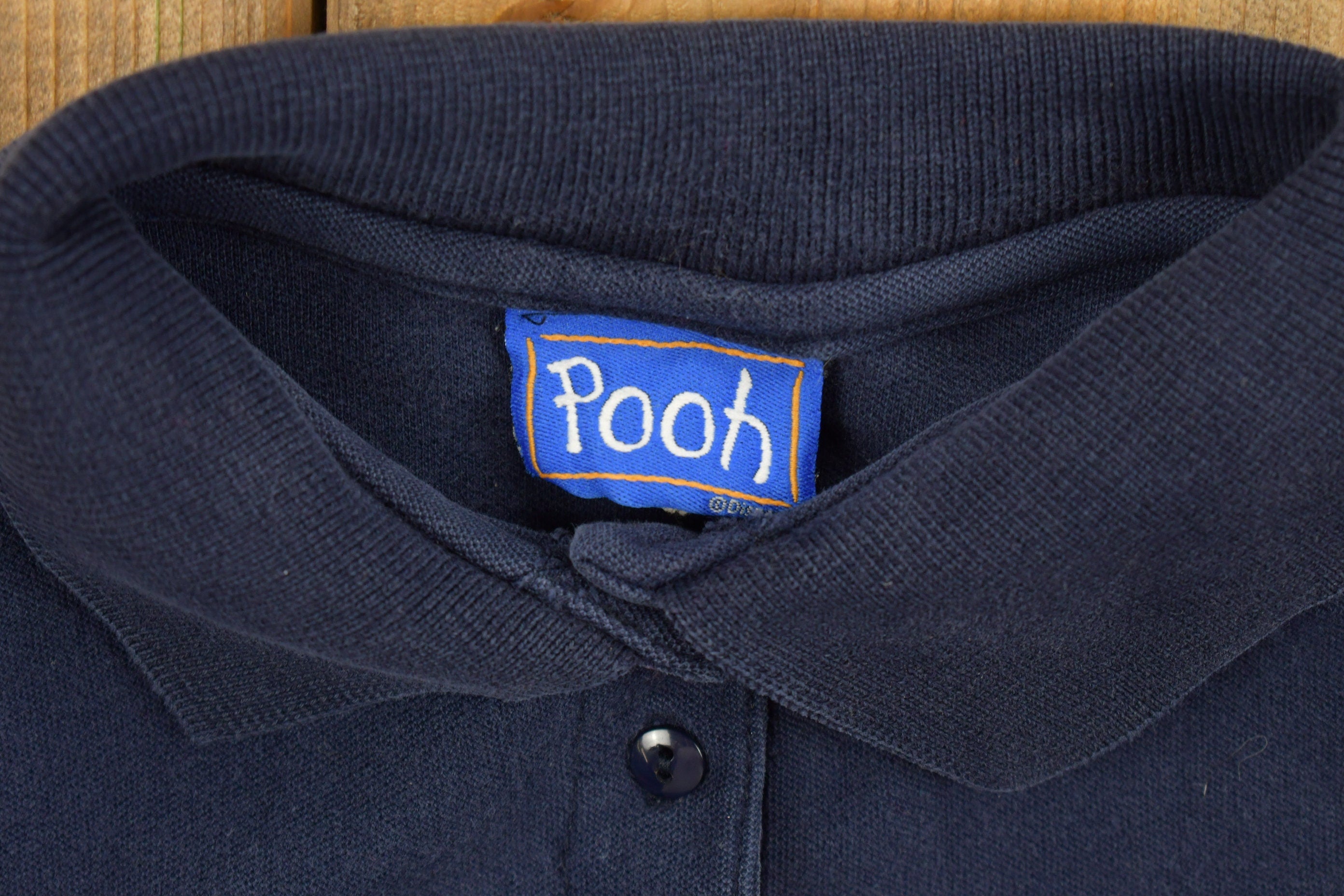 Vintage 1990s Winnie The Pooh Printed Sleeveless Polo Shirt