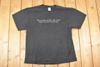 Vintage 1990s World Revolves Around Me Comedy Souvenir T-Shirt Men's L