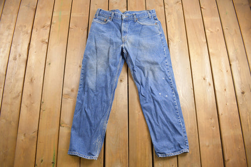 Vintage 1990s Levi's 550 Red Tab Jeans Size 36 x 29.5 / Blue / Denim / Made In USA / 90s Levi's / Tapered Fit / Distressed