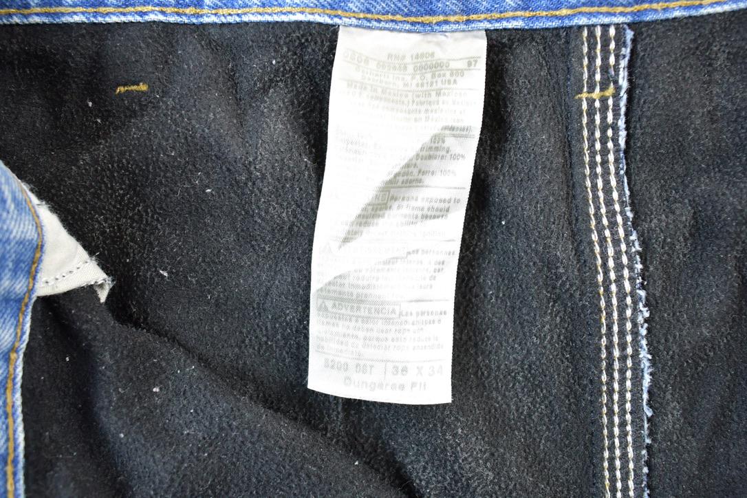 Vintage 1990s Carhartt Lined Denim Work Jeans Size 36 x 34 Made In USA