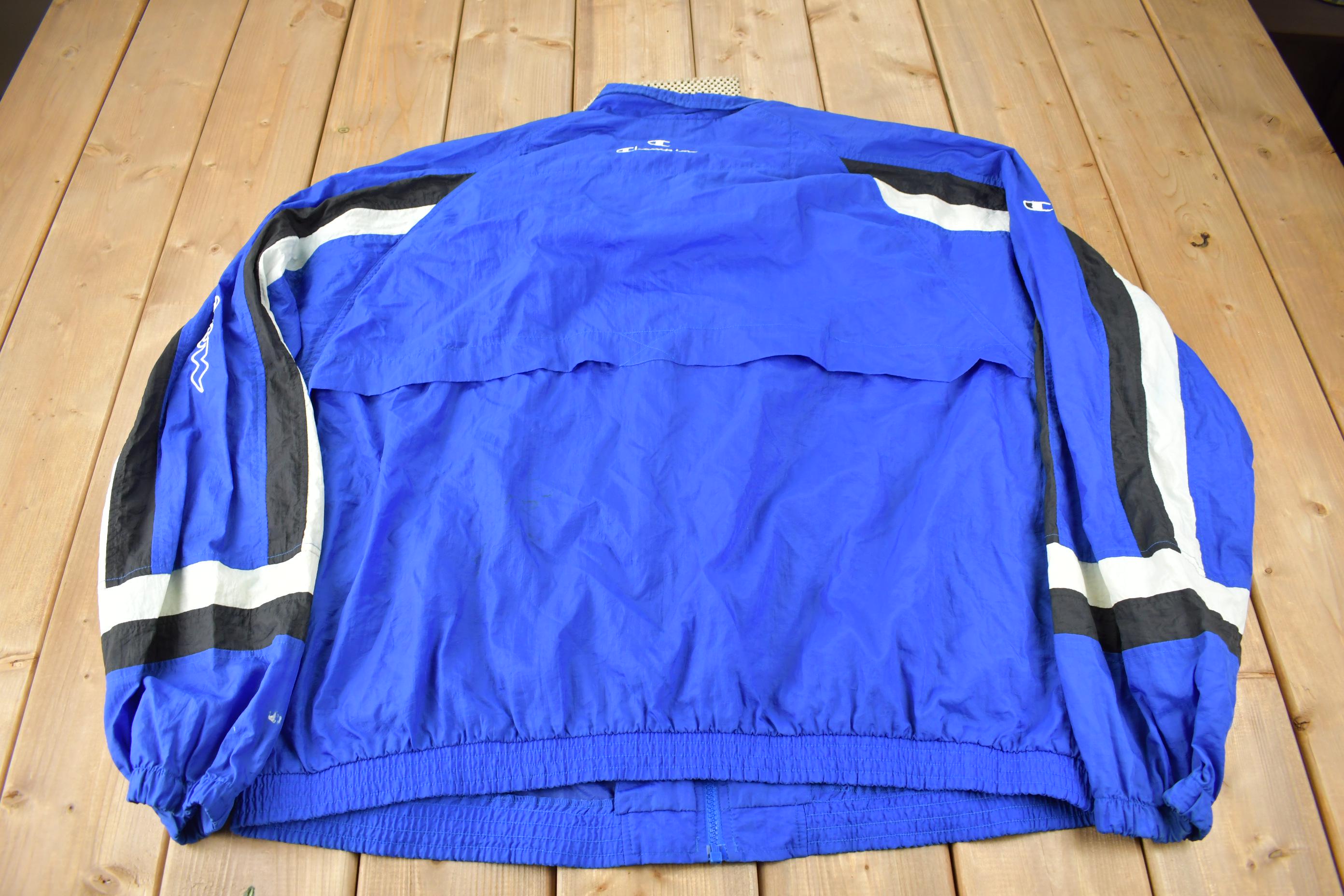 Vintage 1990s Champion Embroidered Spell Out Windbreaker
