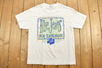 Vintage 1990s Blue Jeans for Babies Charity Graphic T-Shirt