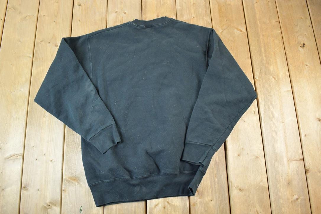 Vintage 1990s Black And Blue Pride Souvenir Football Crewneck Sweatshirt Made In USA