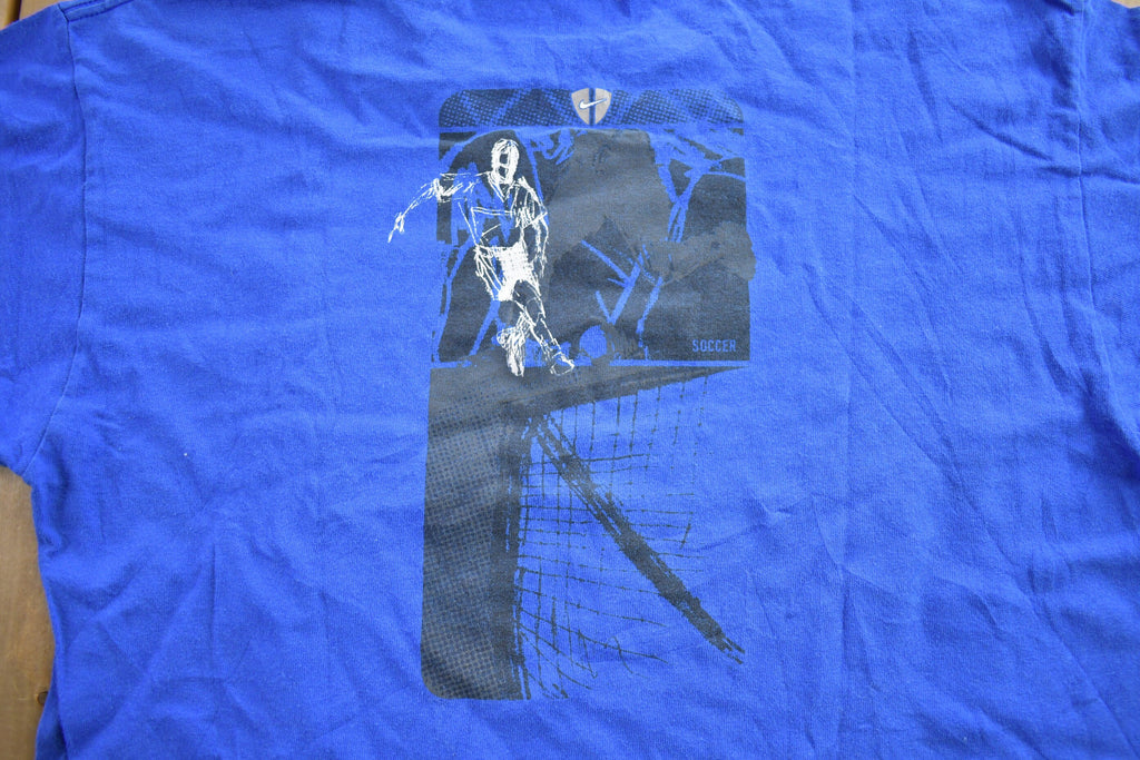 Vintage 1990s Nike Soccer Graphic T-Shirt Made In USA Size XL
