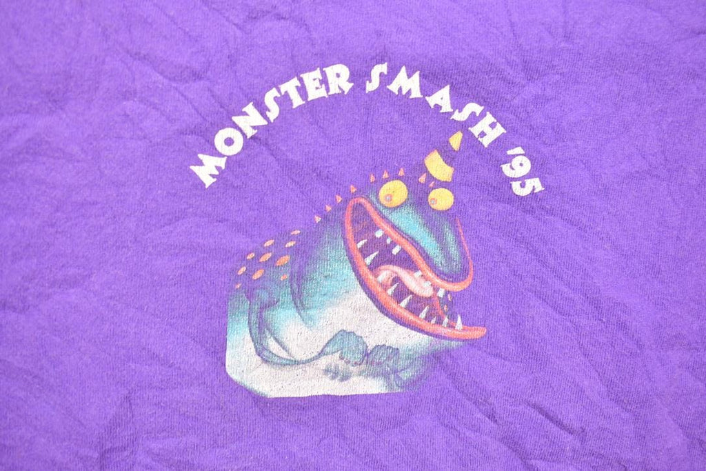 Vintage 1990s Fruit of The Loom Monster Smash '95 Travel T Shirt Made In USA Single Stitch