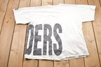 Vintage 1990s Starter Los Angeles Raiders NFL Graphic T-Shirt