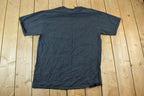 Vintage 1990s Noel Souvenir Single Stitch Graphic Print T-Shirt