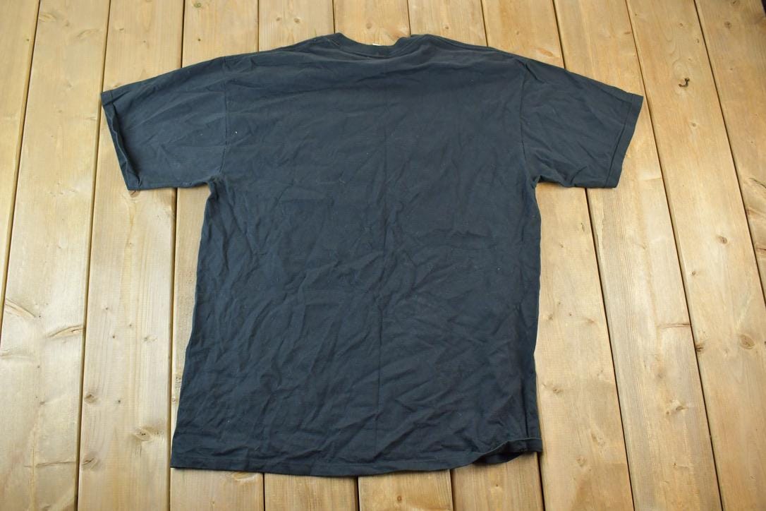 Vintage 1990s Noel Souvenir Single Stitch Graphic Print T-Shirt